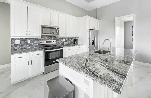 Port Charlotte Villa | Sweet Retreat, Sleeps 6, heated salt pool