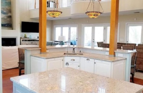 Butler Beach House | The Sand Castle Heated Pool Atlantic Ocean