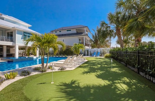 Anna Maria House | The Willow Inn: Huge Pool, Game Room, One Block to Beach by Anna Maria Life Vacation Rentals