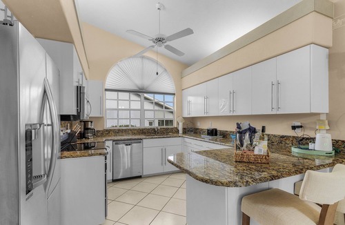 Eisenhower House | The Yellow | Lakefront Home, Heated Pool & Spa