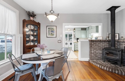 Salida House | This 2-bedroom Victorian cottage features comfortable, modern furnishings, well-equipped kitchen, and a spacious green yard with a shady back patio and a front porch swing. On the quiet edge of downtown, across the street from Alpine Park.