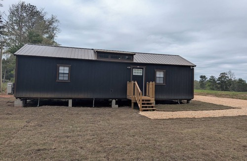 Evergreen House | This memorable cozy 2-bedroom Genesis Get Away house is a Peaceful Escape.