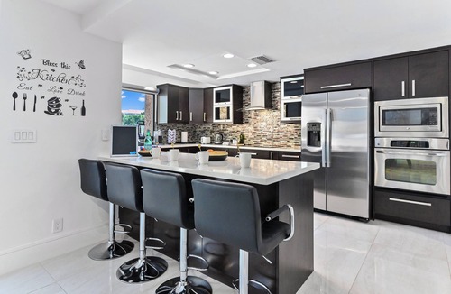 Deerfield Beach House | Tiki Escape: Heated Pool & Luxe King Suite