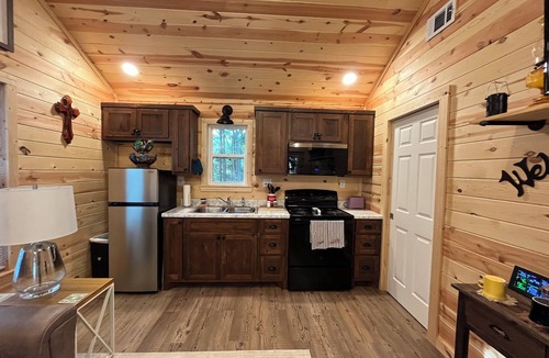 Powderly House | Tiny House -Whispering Pines on a quiet country road