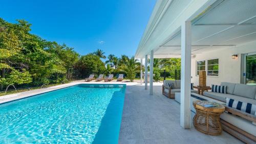 Riverside Villa | Tranquility Villa Heated Pool & Lanai