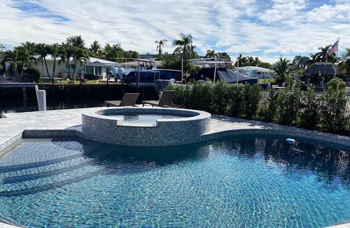 Garden Isles House | Tropical Escape Entire 3 bedroom House w/heated pool and hot tub