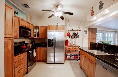 Cypress Point House | Tropical Getaway! Walking distance to beach & dining, private home, heated pool.