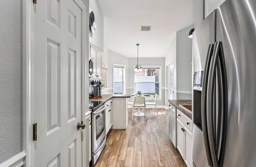 New Port Richey House | TROPICAL RETREAT WITH PRIVATE HEATED POOL-TAMPA BAY.