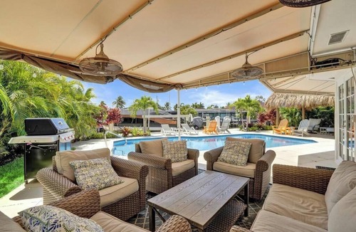 Garden Isles House | Tropical vacation retreat! Waterfront and Heated pool!
