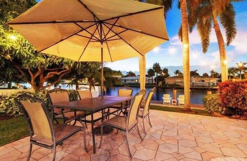 Cypress Lakes Villa | Tropical Waterfront Home: Pool & Boat Rental