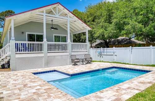 Butler Beach House | Tropical Winds - Heated Pool & Firepit! Walk to the Beach!