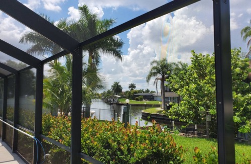 Caloosahatchee House | Twin House shared Volleyball pool 3 King bedrooms, 2 sofa sleepes 8
