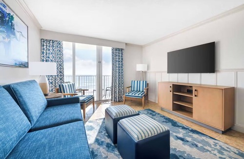 Elrod Estates Hotel | Two Coastal 2BR Units for Pool Relaxation, Ocean Walks & Family Fun