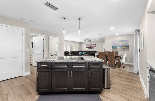 Saint James City House | TWO MASTER SUITES-POOL -WATERFRONT ON CORNER LOT - BOAT LIFT -OUTDOOR KITCHEN