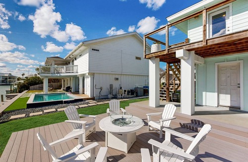 Key Allegro House | Two-Story Family-Friendly home on the water with patio and firepit