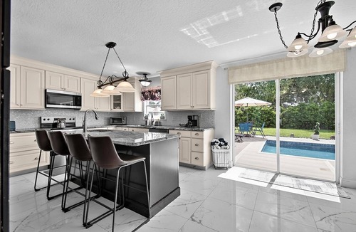 Palm Coast House | Ultimate Coastal 6BR Home w/Private Pool & Hot Tub | Near Flagler Beach | Palm Coast | Sleeps 10+