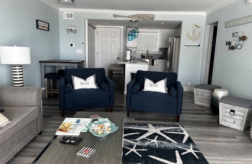 Holiday Isle Condo | Updated beachfront condo - Hear the waves from your room. Beach chair service!