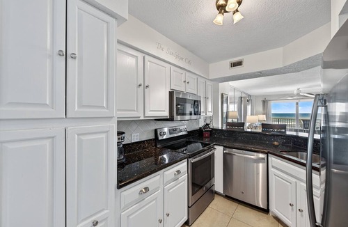 Seawinds Condo Condo | Updated direct oceanfront 2/2, corner condo with private balcony, heated pool and garage