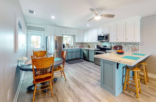 Mexico Beach House | Updated home across from beach with firepit, sunroom, & fast WiFi - snowbirds OK