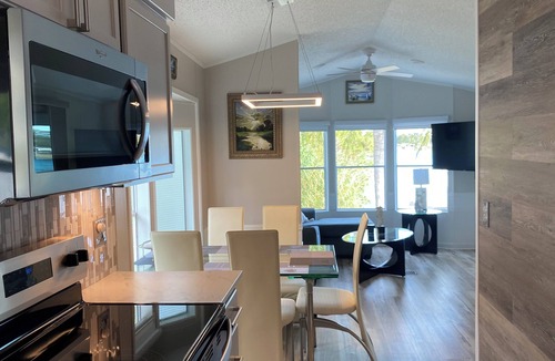 Braden River House | Updated Lakefront Home with Private Trail & Golf Cart