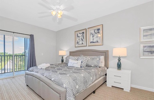 West Kissimmee Apartment | Upscale 3BR Condo with Netflix and shared Pool and Hot Tub, near Disney!