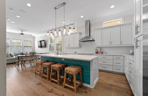 Villa Lago House | Venetian Boardwalk with Low-Speed Vehicle, Pool, and Waterfront Views