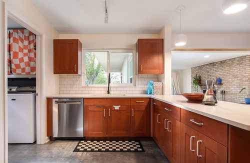 Audubon Park House | Vibrant Orlando Lakefront Cat Lover's Retreat with Pool & Gardens