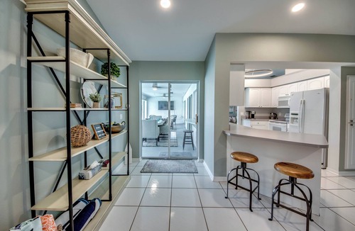 Caloosahatchee Villa | Villa Sunset Hideaway - Stylish 4 BR/2 bath waterfront Villa with heated pool/bicycles