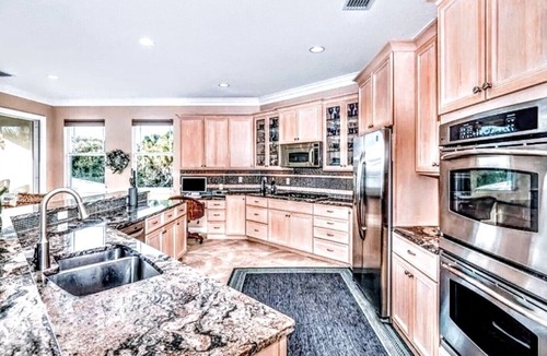 North Beach House | Walk to Beach Heated Pool + Hot Tub Private Putting Green Island Oasis