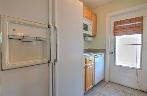 Coquina Sands Condo | Walk to Lowdermilk Beach From This Amazing & Cute Condo with Back Bay Views!
