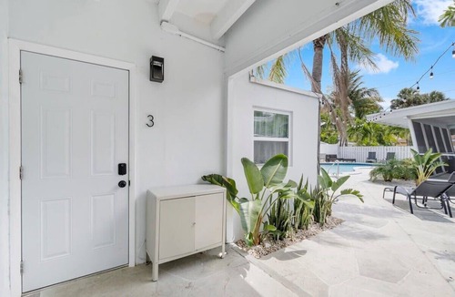 Dolphin Isles Apartment | Walk To The Beach | Fire pit + Pool | Coconut Unit
