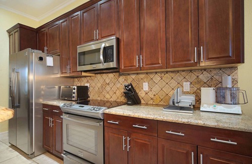 Caloosahatchee Villa | WATER VIEW, DIRECT GULF ACCESS , OVERSIZE POOL, GrilL, POOL BAR , TV