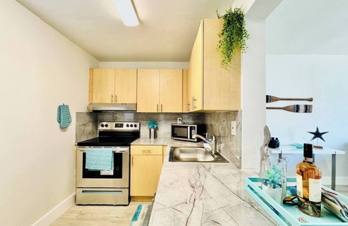 Eastern Shores Apartment | Waterfront 1BR, Parking , Walk to the Beach