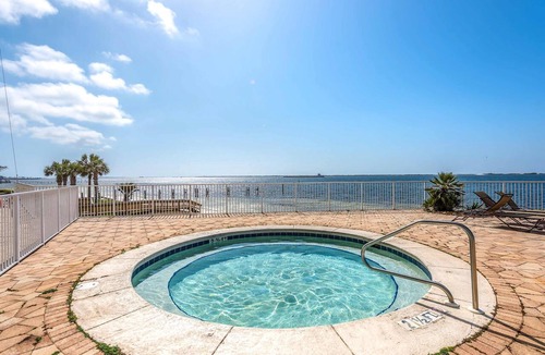 Ono Island Condo | Waterfront condo with beach access, pools, balcony, central AC, & W&D