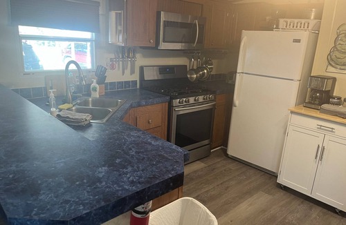 Satsuma House | Waterfront home in Satsuma. Two bedrooms each with full bath. Gas grill.
