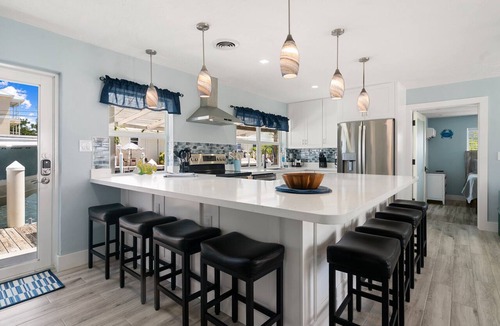 Little Venice House | Waterfront Home w/Private Dock, Outdoor Shower & Home Office - Dog-Friendly
