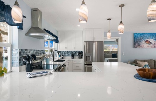 Little Venice House | Waterfront Home w/Private Dock, Outdoor Shower & Home Office - Dog-Friendly