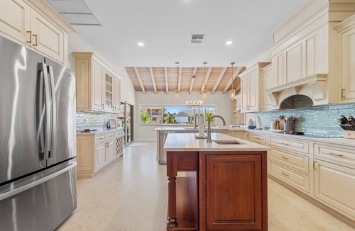 Lighthouse Point House | Waterfront Lux 4BR! New Reno with Heated Pool + Outdoor Kitchen