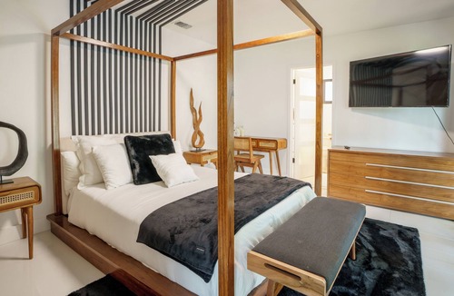 North Central Hollywood House | Waterfront Master bedroom.