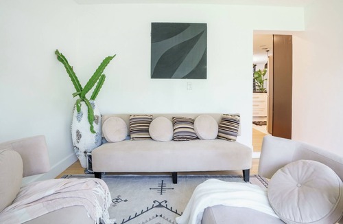 North Central Hollywood House | Waterfront Master bedroom.
