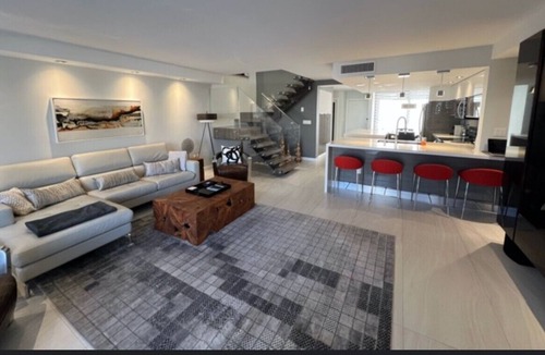 Garden Isles Condo | WATERFRONT MODERN 2 STORY CONDO SEASONAL RENTAL