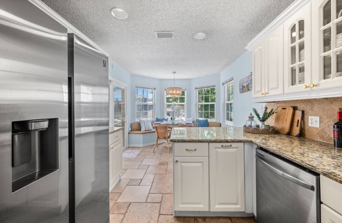 Palm Harbor House | Waterfront Oasis - Heated Pool, Kayaks + Game Room