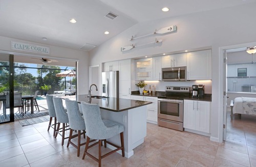 Pelican House | Waterfront Paradise in Cape Coral, 4BR Salt Pool & Spa