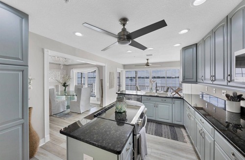 Palm Island House | Waterfront Retreat: Fish, Kayak,Paddleboard on Property +Pool/Spa-Heat available