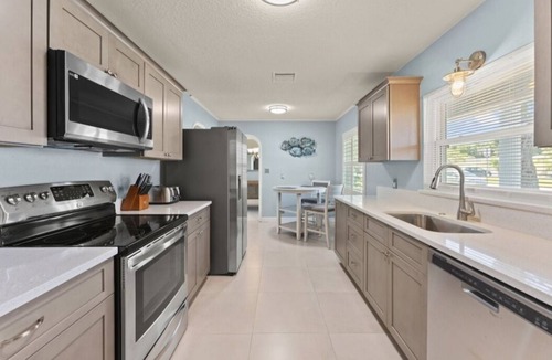 Convair Cove House | Waterfront w/Free Pets, Private Dock, Paddleboards, Pool Table, and 5 Smart TVs