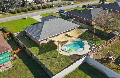 Navarre House | Whispering Getaway | Heated Pool, Premier Game Room & Dual King Suites