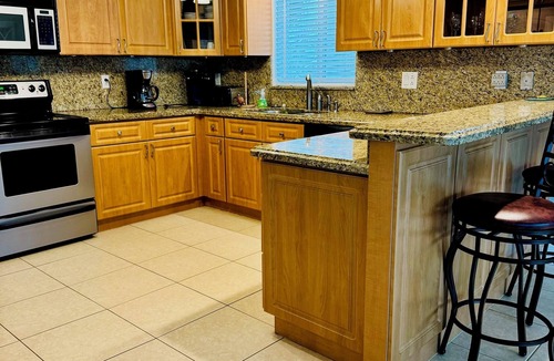 Marathon House | Yellowtail Island Retreat - 3BR Keys Home w/Pool, Dockage, Porch & Canal Access