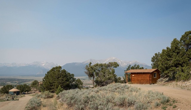 1 Room Dry Camping Cabin. Sleeps up to 4 in one queen bed and a set of twin bunks (bunk bed linens provided upon request).
