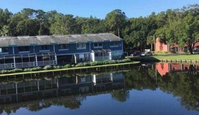 2 Couple island condo in a Florida nudist resort.