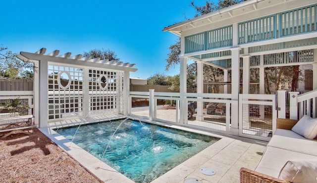 2 minute walk to the Beach. Private Heated Pool. New 2026 6 Seater Golf Cart.